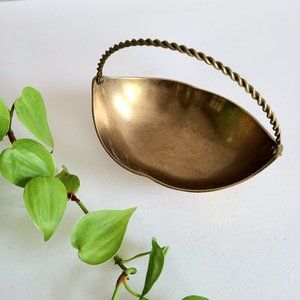 Vintage brass trinket dish basket shape.